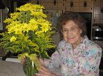 Kitty with 90 yellow daisies that Ron Harman and I presented to her in honor of her 90th birthday
